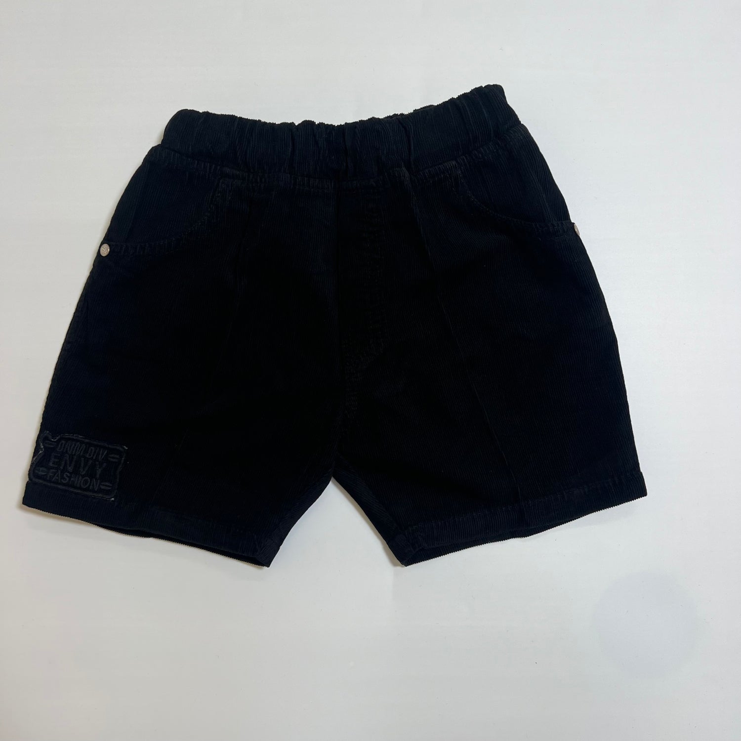 Soft and stylish kids’ corduroy shorts with elastic waist, available in multiple colors. Perfect for daily wear and playtime.
